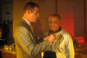 The Ambassador of France to India, Mr J&eacute;r&ocirc;me Bonnafont, conferring the distinction of Chevalier dans l'Ordre des Arts et des Lettres on Classical flute exponent Pandit Hariprasad Chaurasia