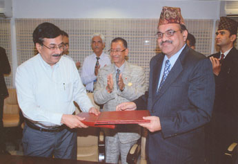Civil Aviation Secretary M. Madhavan Nambiar with his Nepalese counterpart Nagendra Prasad Ghimire during the signing of MoU in New Delhi