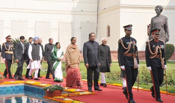 The President, Mrs Pratibha Devisingh Patil, being led in a ceremonial procession to the Central Hall of Parliament House to address the Members of both the Houses of Parliament on Budget Session, in New Delhi on February 21, 2011. The Speaker, Lok Sabha, Mrs Meira Kumar, the Vice President and Chairman Rajya Sabha, Mohd. Hamid Ansari, the Prime Minister, Dr. Manmohan Singh, the Union Minister for Parliamentary Affairs, Science & Technology and Earth Sciences, Mr Pawan Kumar Bansal and other dignitaries are also seen. 
