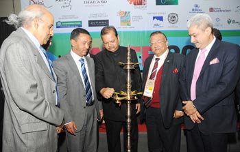 Union Minister for Tourism Subodh Kant Sahai lighting the lamp to inaugurate the SATTE Travel and Tourism Exchange in New Delhi on January 28, 2011