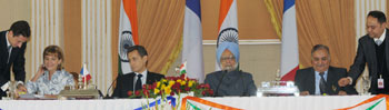 The CEO, AREVA, Mrs. Anne Lauvergeon and the CMD, NPCIL, Dr. S.K. Jain signing an Early Works agreement between NPCIL and AREVA for Implementation of EPR NPP Units at Jaitapur Site, Maharashtra, in the presence of the Prime Minister, Dr. Manmohan Singh and the President of France, Mr. Nicolas Sarkozy, in New Delhi on December 6, 2010.